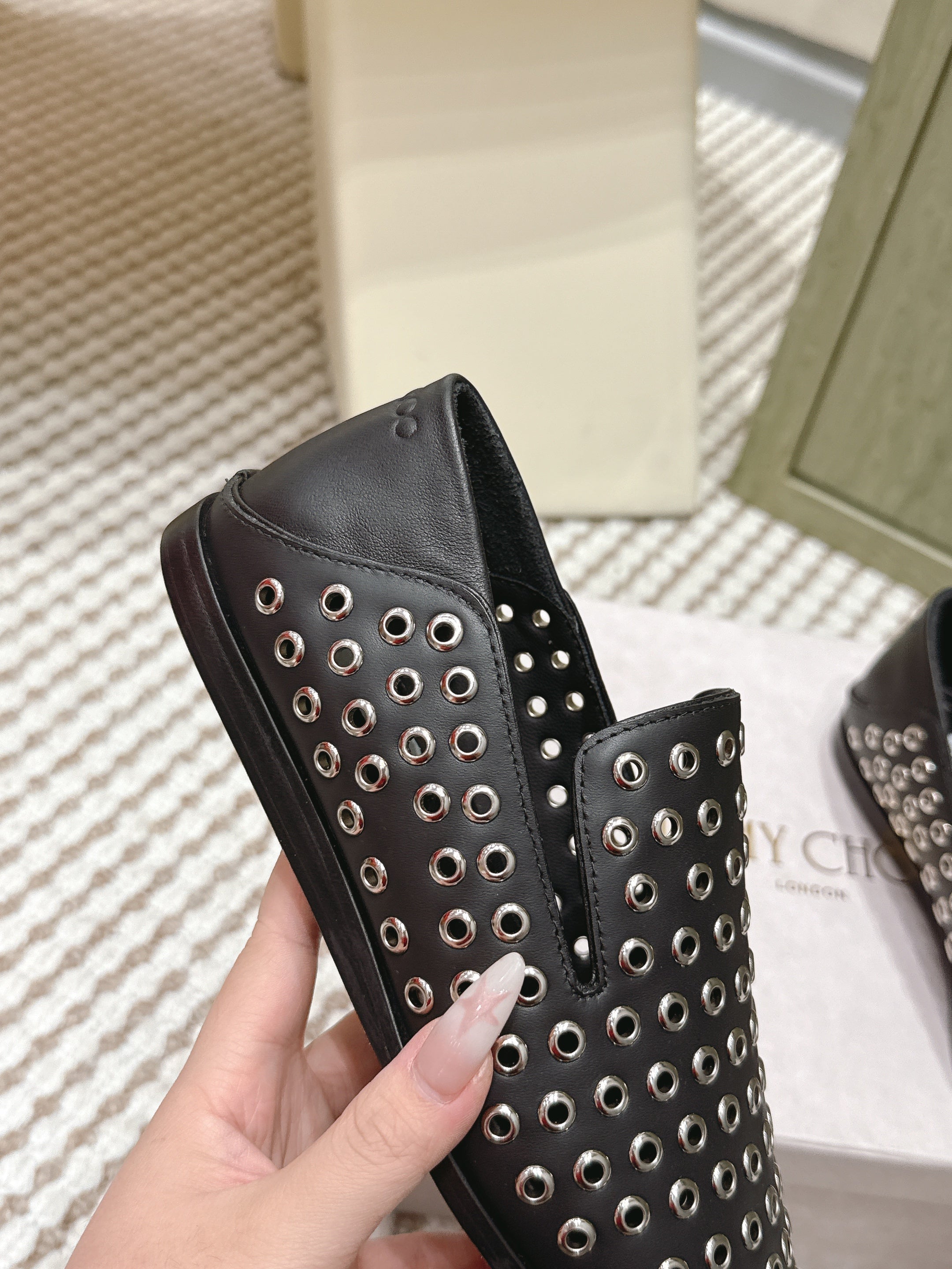 Jimmy Choo Eliot flat Slippers Metallic Eyelets Black Calfskin 568492