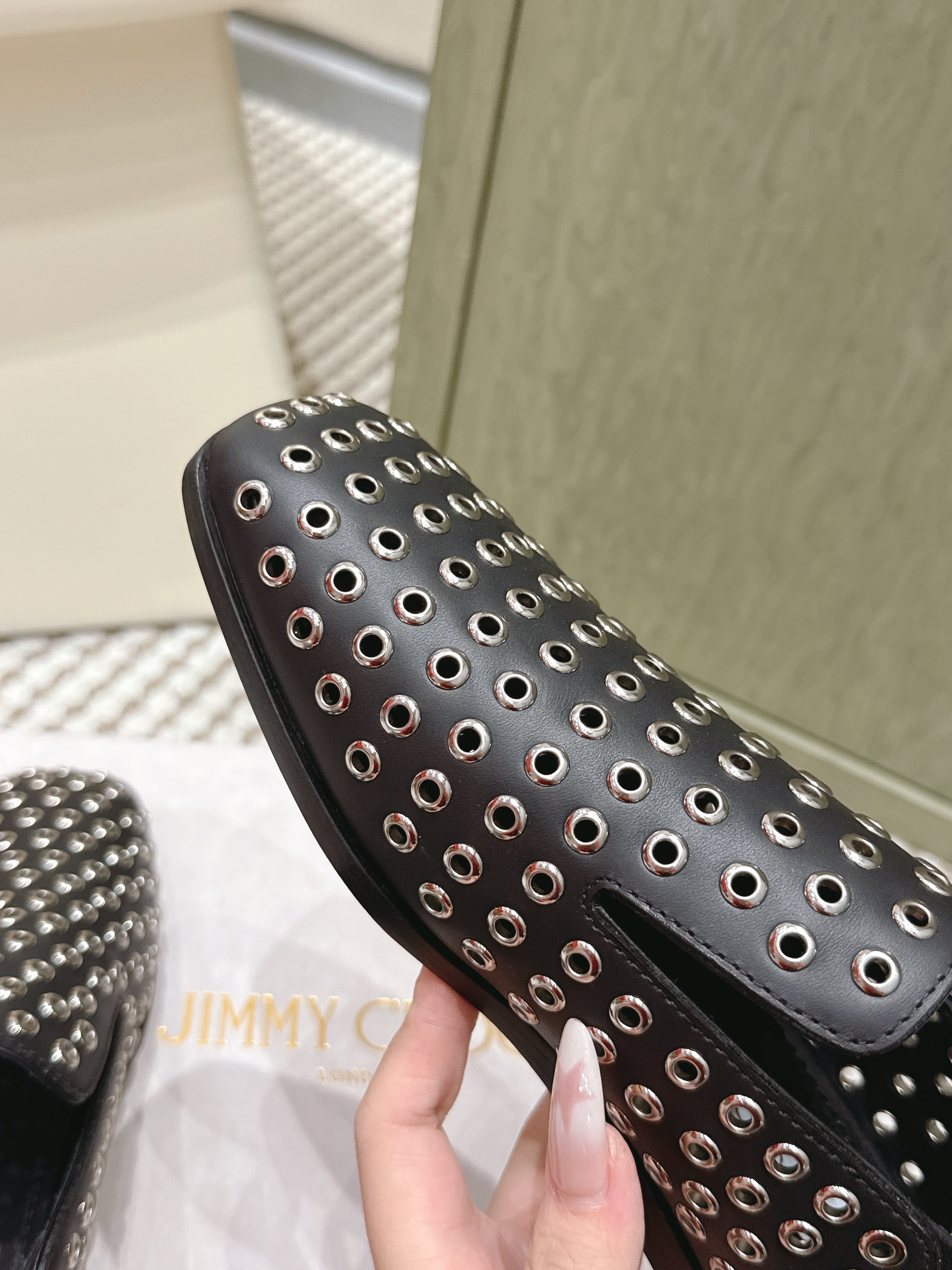 Jimmy Choo Eliot flat Slippers Metallic Eyelets Black Calfskin 568492