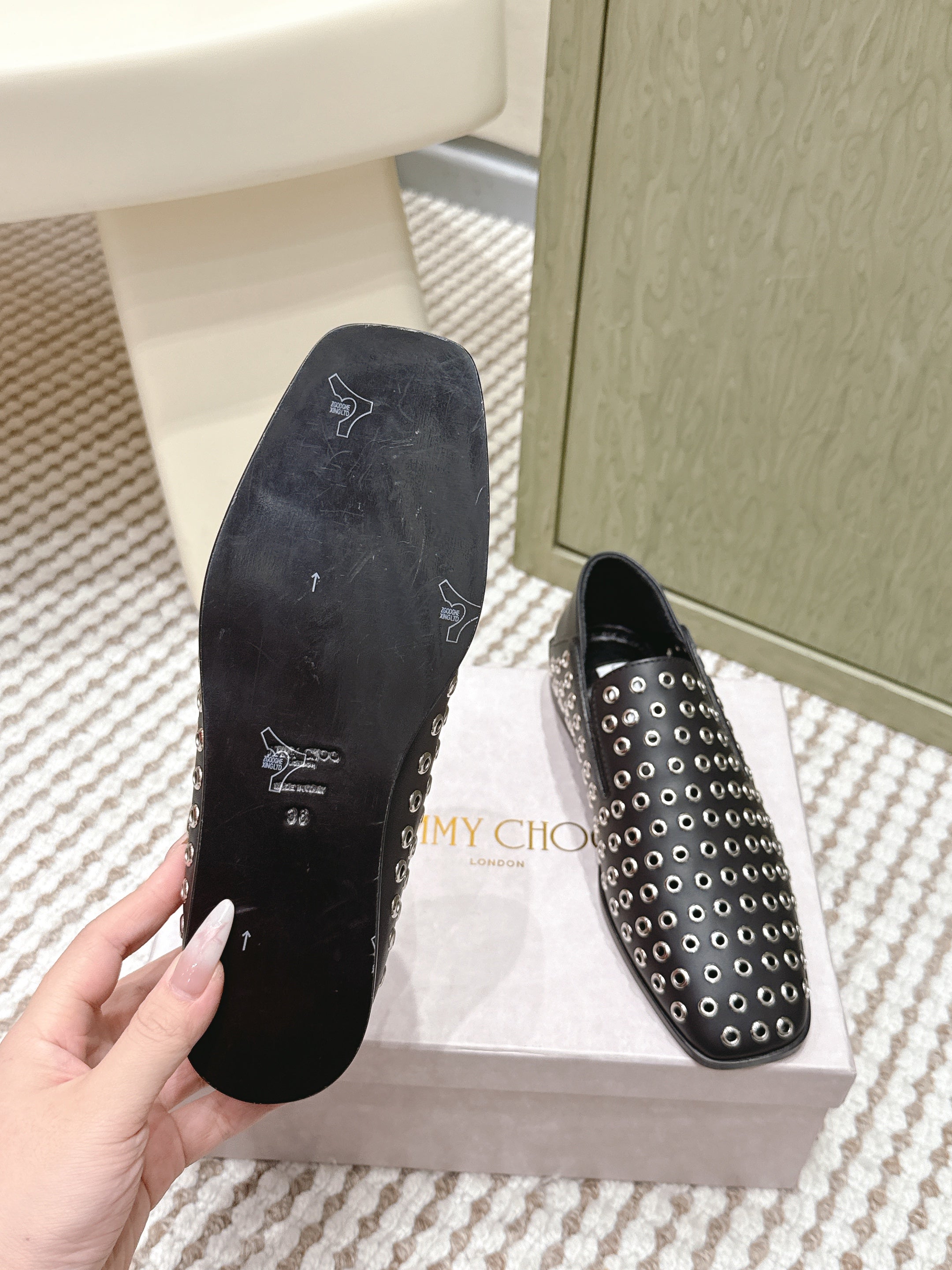 Jimmy Choo Eliot flat Slippers Metallic Eyelets Black Calfskin 568492