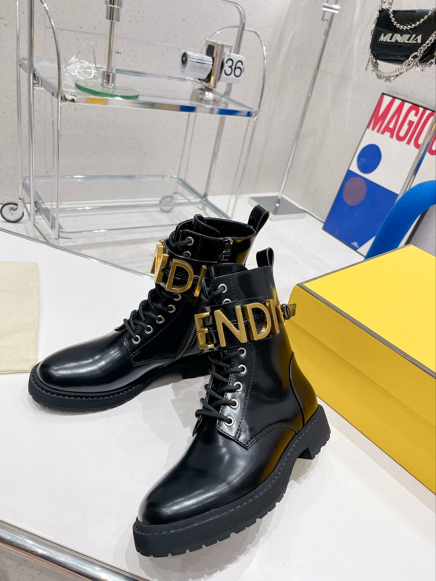 Fendi Martin Boots with Metal Buckle Black in Cowhide 576792