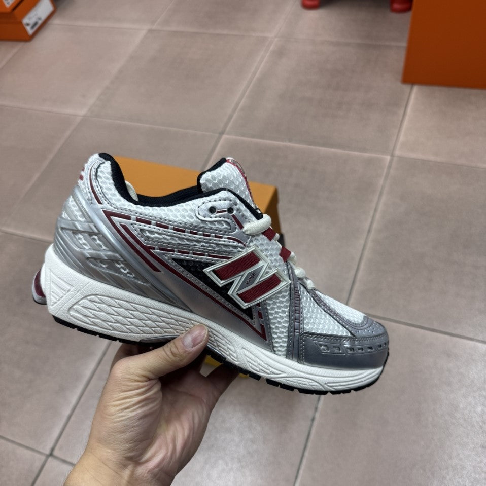 New Balance 1906R Low in the Silver Classic Crimson Mesh Calfskin