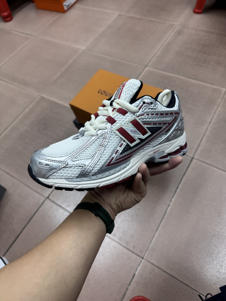 New Balance 1906R Low in the Silver Classic Crimson Mesh Calfskin