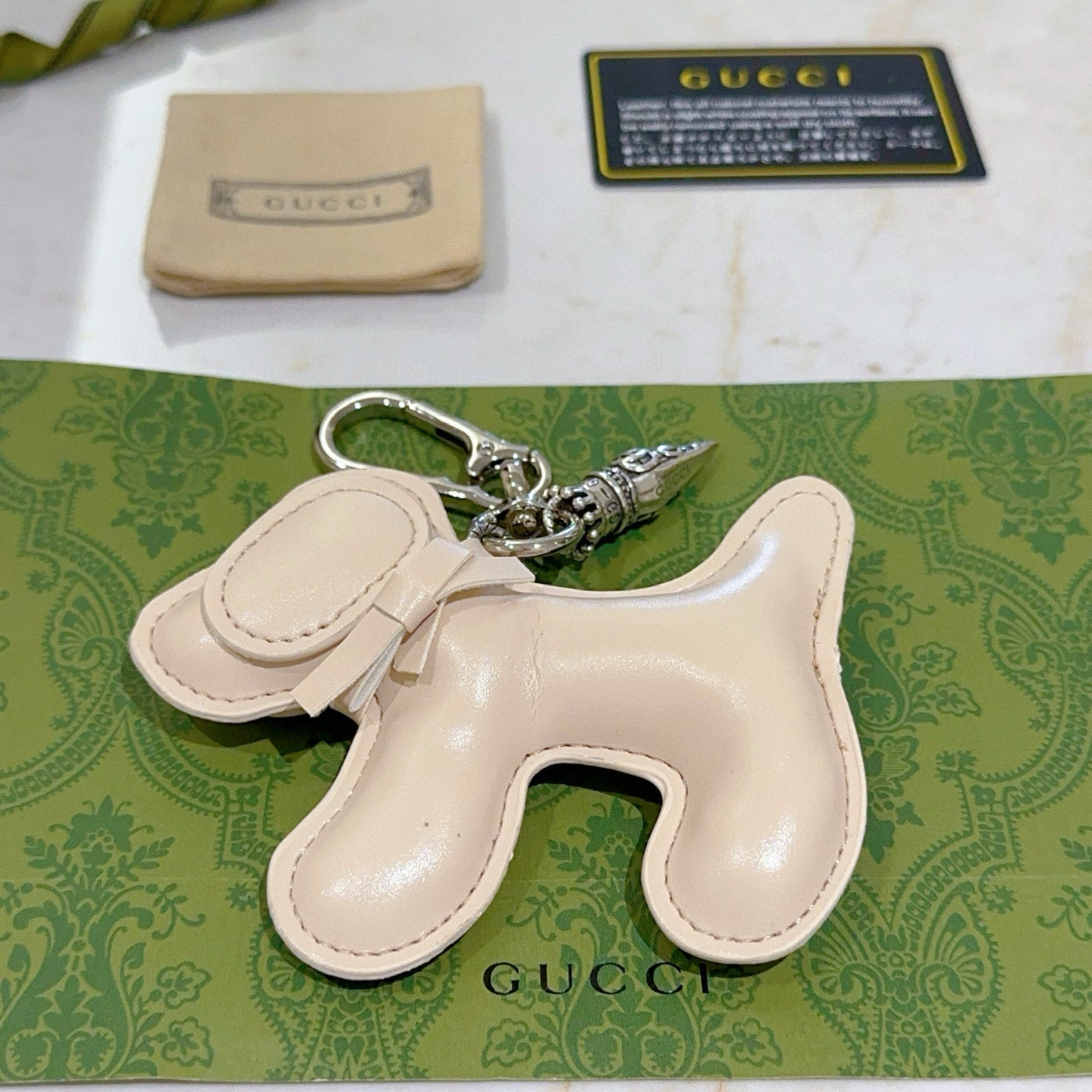 Gucci Beige Dog Charm