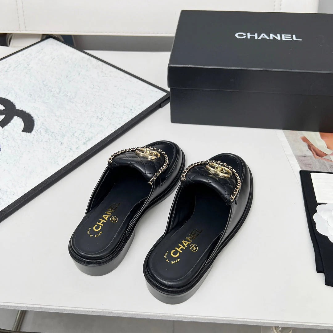 CHANEL 25S MULES WITH CHAIN DETAIL IN BLACK CALFSKIN GOLD HARDWRE