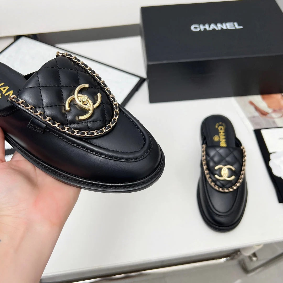 CHANEL 25S MULES WITH CHAIN DETAIL IN BLACK CALFSKIN GOLD HARDWRE