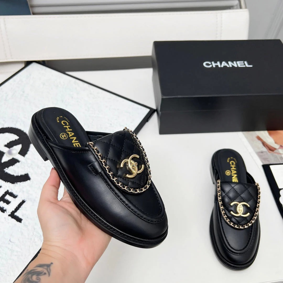 CHANEL 25S MULES WITH CHAIN DETAIL IN BLACK CALFSKIN GOLD HARDWRE