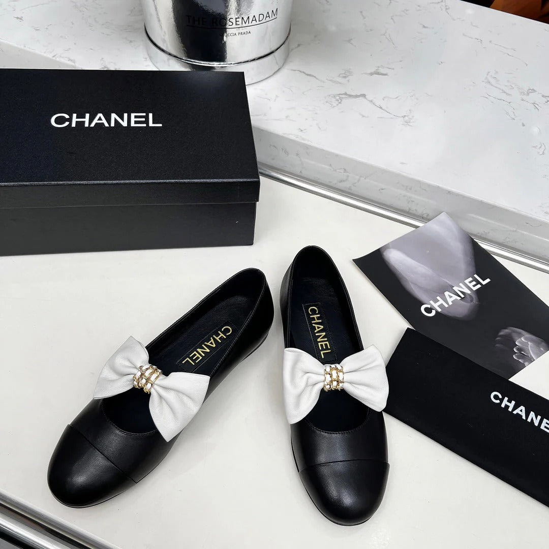 CHANEL 25S MARY JANES IN BLACK CALFSKIN WITH WHITE BOW GOLD HARDWRE