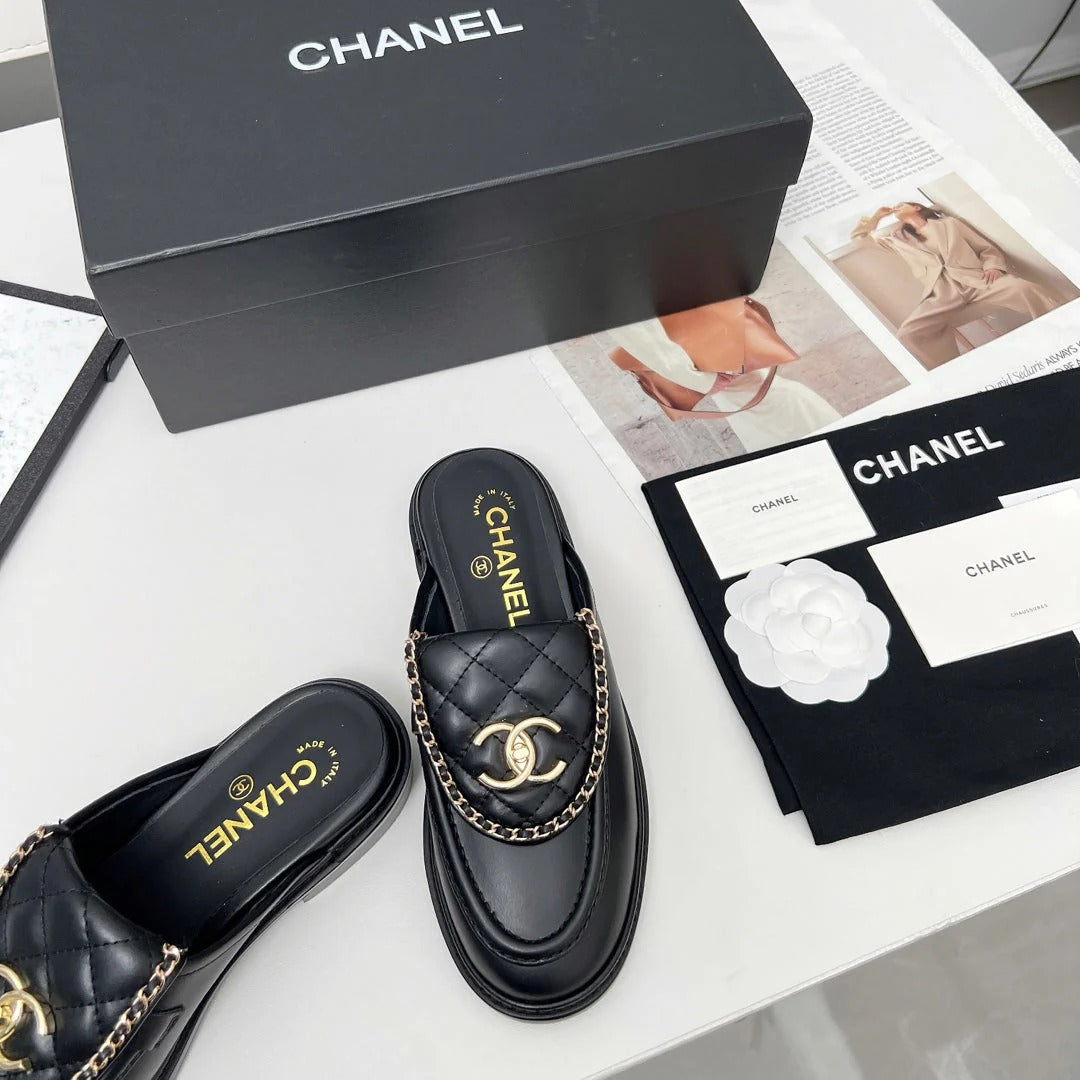 CHANEL 25S MULES WITH CHAIN DETAIL IN BLACK CALFSKIN GOLD HARDWRE